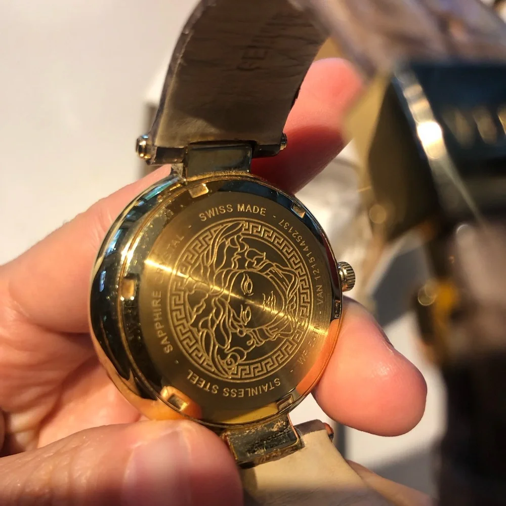 Versace White Dial Watch with Gold Bezel and Brown Strap